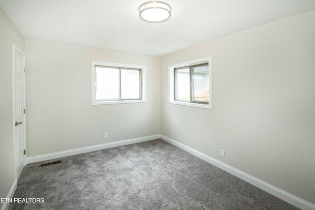 view of carpeted spare room