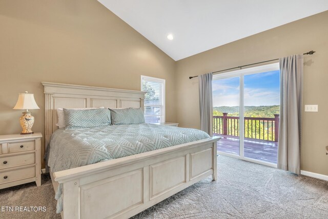 bedroom featuring light carpet, high vaulted ceiling, and access to exterior