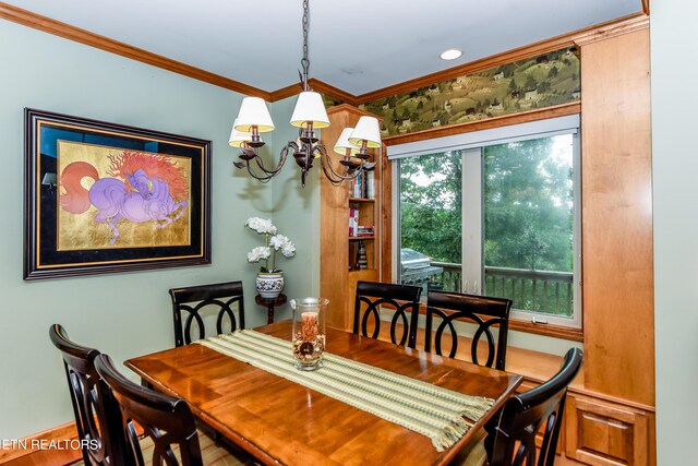 dining room featuring crown molding and a notable chandelier