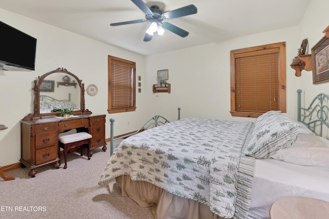 bedroom with light carpet and ceiling fan