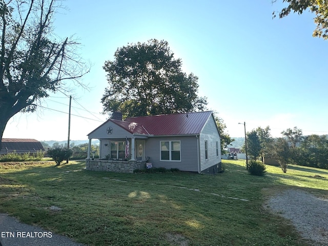 view of front of home with a front yard