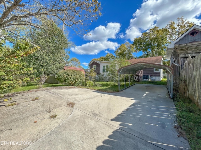 view of parking with a carport