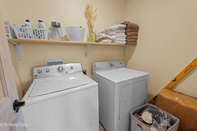 laundry area featuring independent washer and dryer