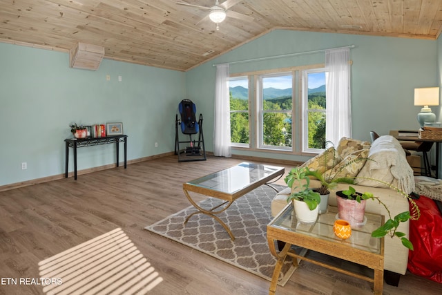 living room with wood ceiling, light hardwood / wood-style floors, lofted ceiling, and ceiling fan