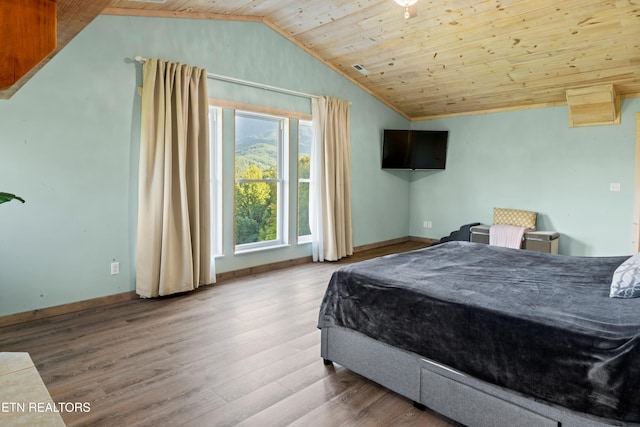 bedroom featuring wooden ceiling, wood-type flooring, and lofted ceiling