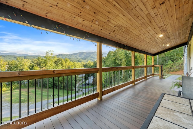 wooden terrace featuring a mountain view