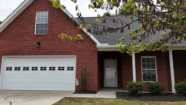 view of front of property with a garage