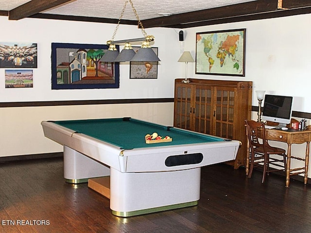 recreation room featuring dark wood-type flooring, billiards, beam ceiling, and a textured ceiling