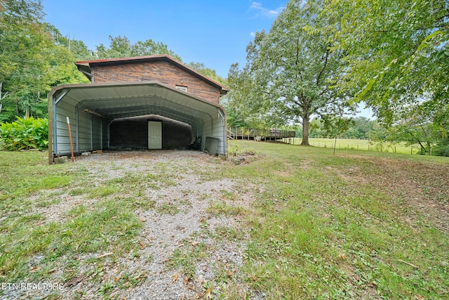 garage featuring a carport