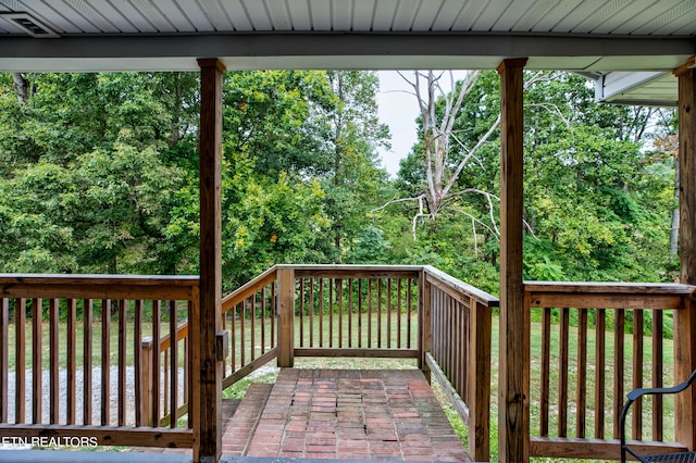 exterior space featuring a wooden deck