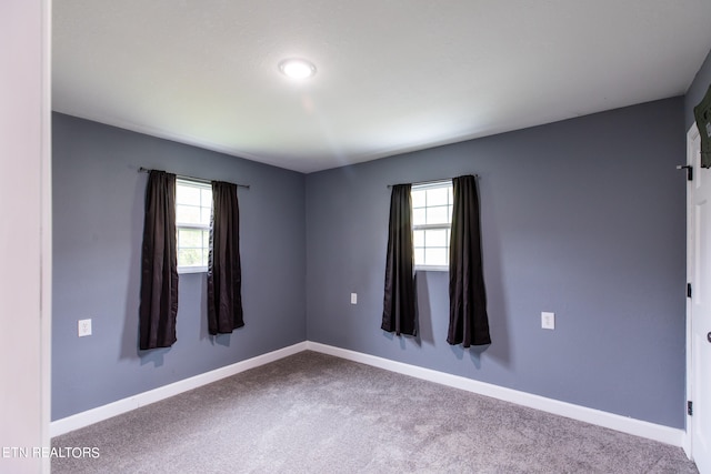 view of carpeted spare room