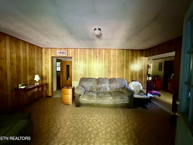 living room featuring wood walls