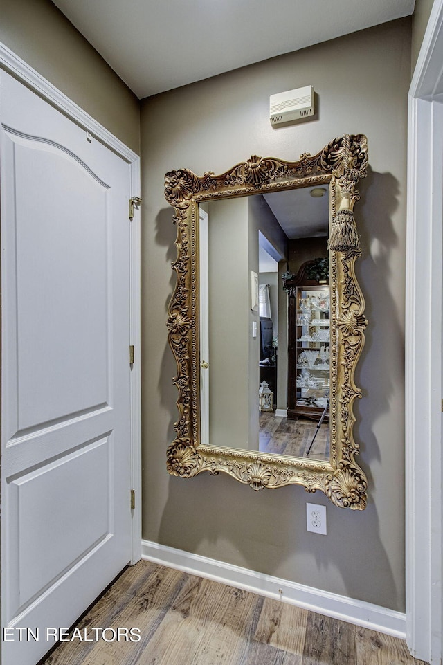 entrance foyer featuring hardwood / wood-style floors