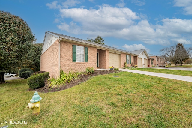 ranch-style home with a front yard and a garage