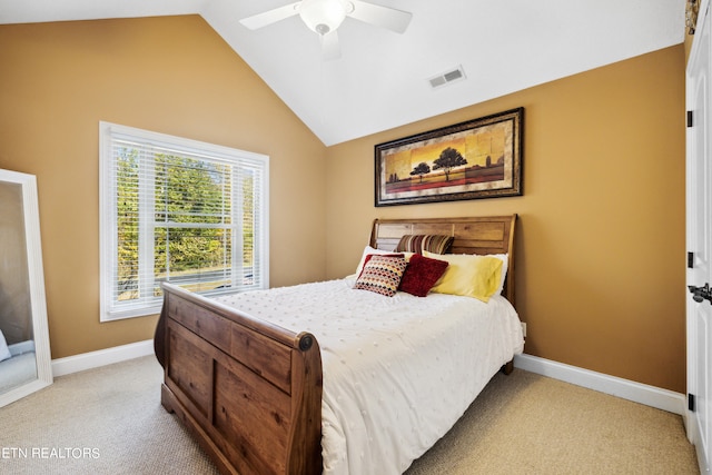 carpeted bedroom featuring ceiling fan and lofted ceiling