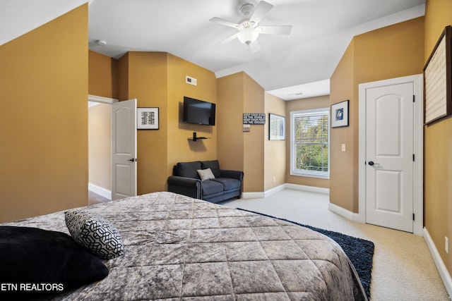 bedroom featuring light colored carpet and ceiling fan