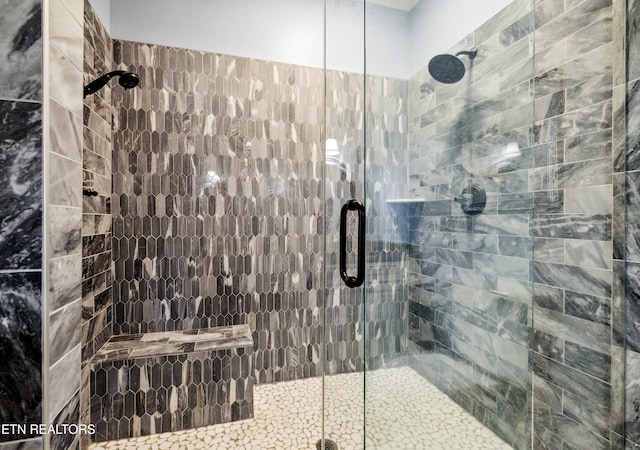 bathroom with an enclosed shower