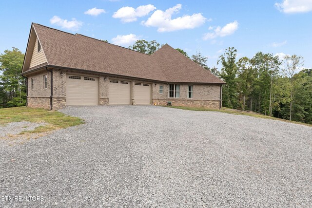 view of front of property with a garage