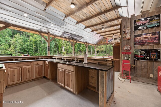 view of patio with an outdoor wet bar