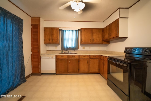 kitchen featuring black / electric stove, ceiling fan, sink, and white dishwasher