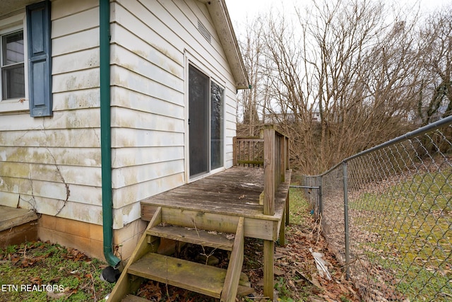 view of home's exterior featuring a deck