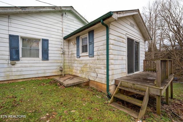 view of home's exterior with a deck