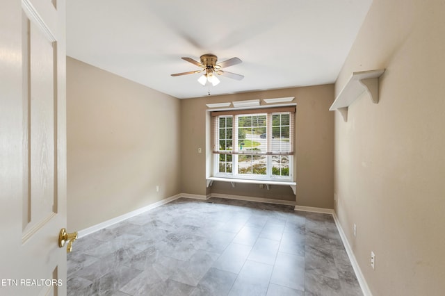 empty room featuring ceiling fan