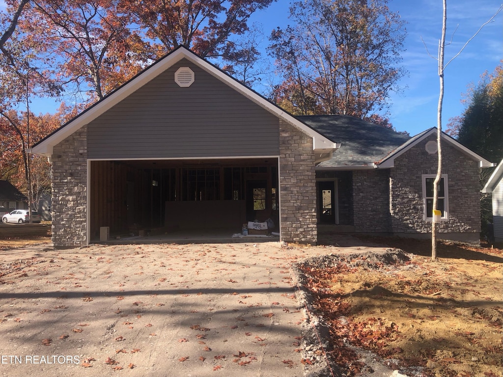 view of front of home featuring a garage