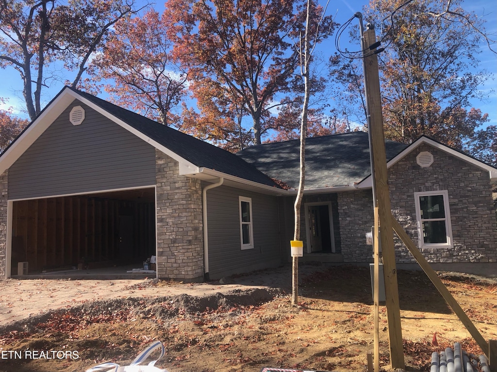 view of front of house with a garage