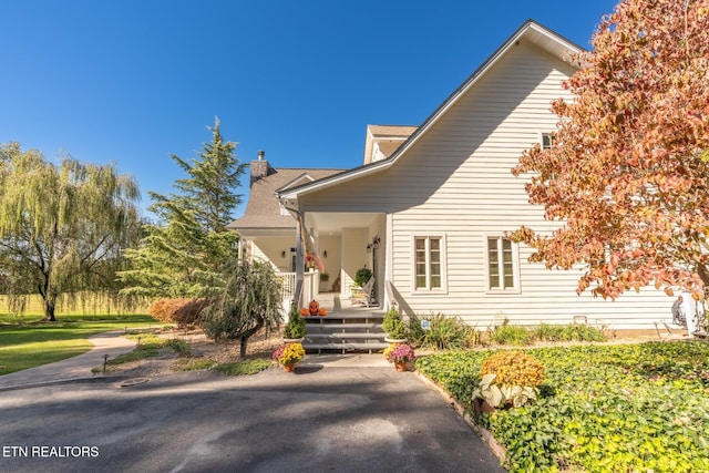 view of front of home featuring covered porch