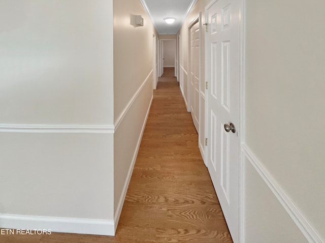 hallway featuring light hardwood / wood-style floors