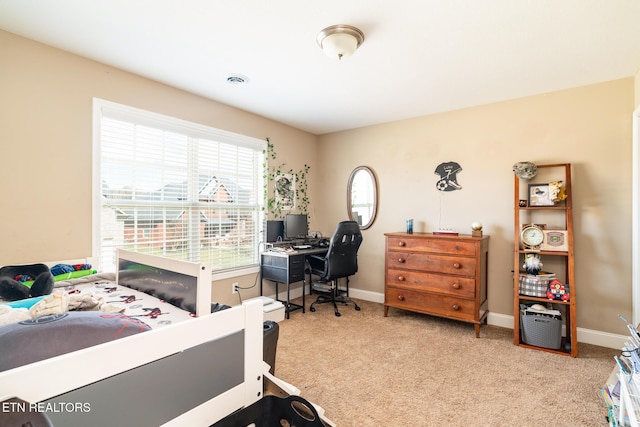 carpeted bedroom with visible vents and baseboards