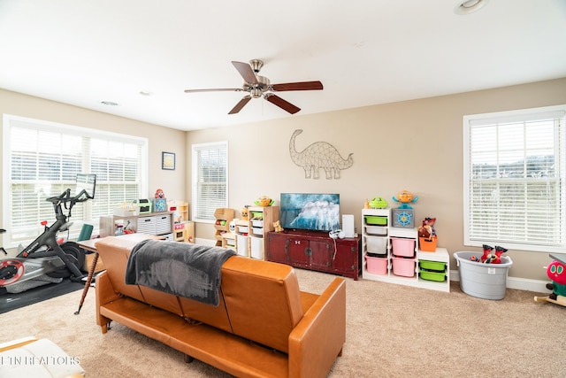 bedroom with carpet floors, ceiling fan, and baseboards