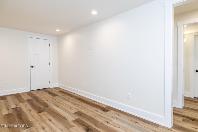 unfurnished room featuring light hardwood / wood-style flooring