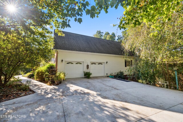 exterior space featuring a garage