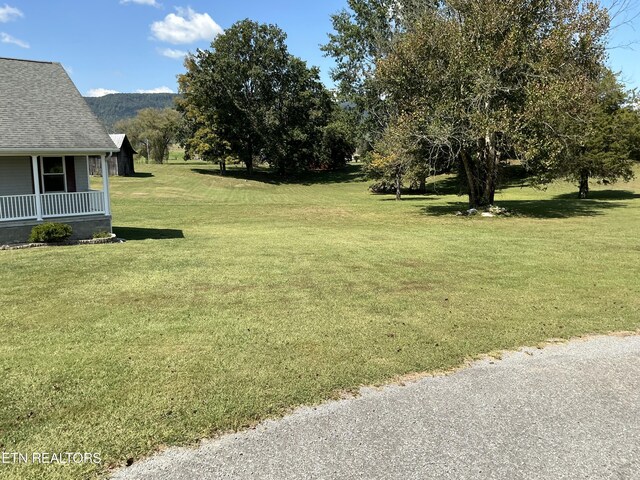 view of yard with a porch