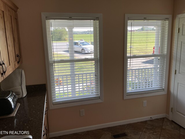 interior space featuring tile patterned flooring