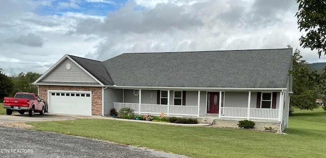 view of front of home with a front yard and covered porch