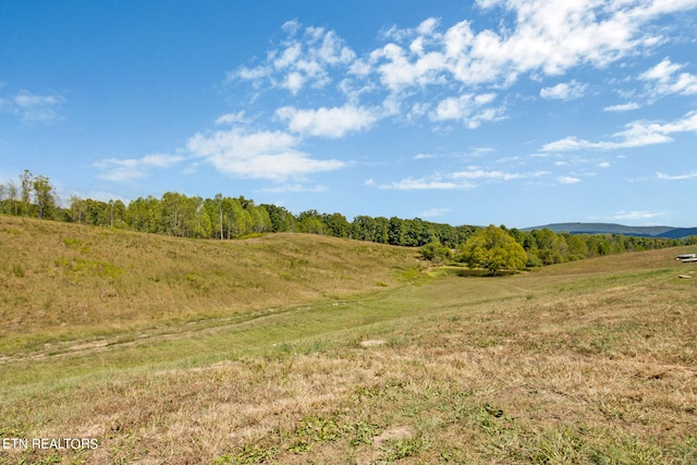 exterior space with a rural view