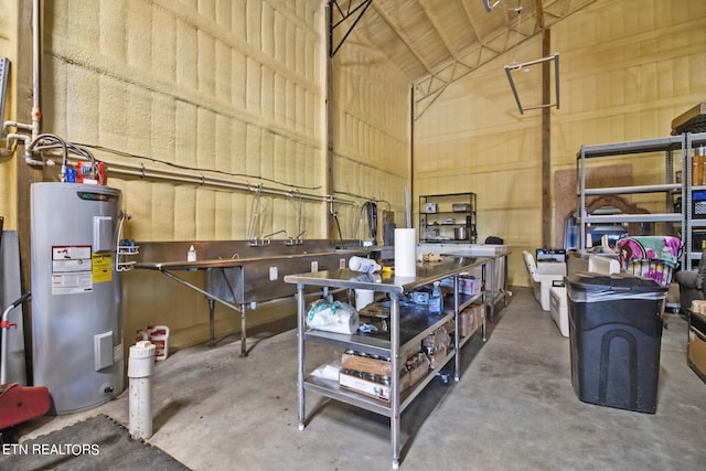 garage featuring electric water heater