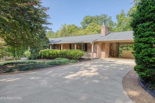 view of front of house with a carport