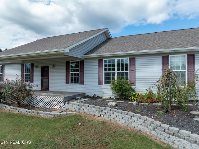 ranch-style house with a front yard