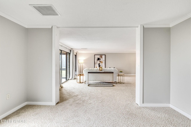 corridor featuring a textured ceiling, carpet, and ornamental molding