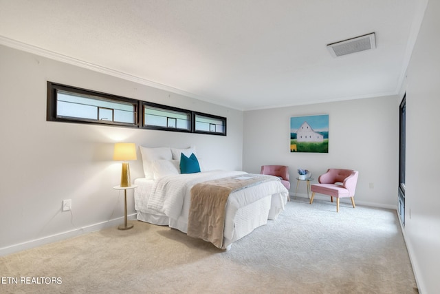 carpeted bedroom featuring crown molding