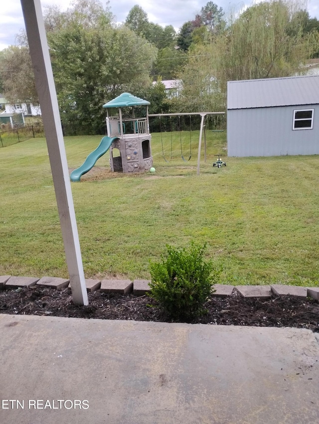 view of yard featuring a playground