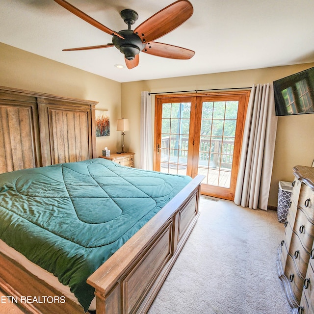 bedroom featuring ceiling fan, light colored carpet, and access to exterior