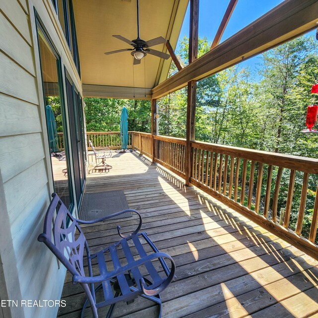 wooden terrace with ceiling fan