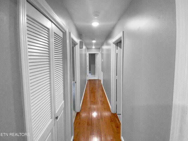 corridor featuring light wood-type flooring