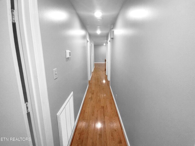 hallway featuring light hardwood / wood-style floors