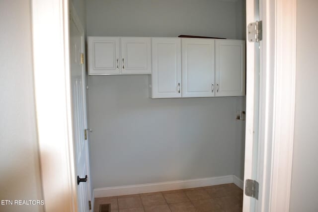 laundry room featuring tile patterned floors